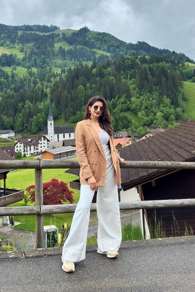 Camel Double-Breasted Blazer + White Ribbed Tank Top + White Wide-Leg Jeans + Cream Athletic Sneakers