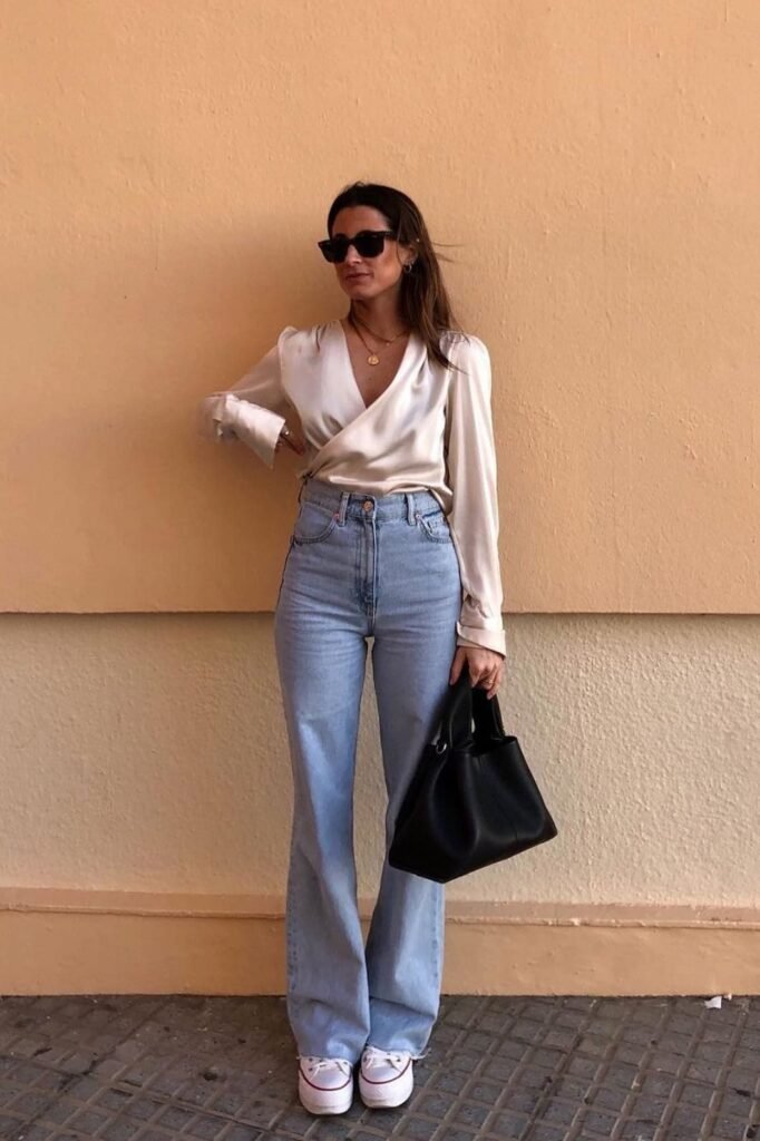 Champagne Satin Wrap Blouse + Light Wash Flared Jeans + White Platform Sneakers