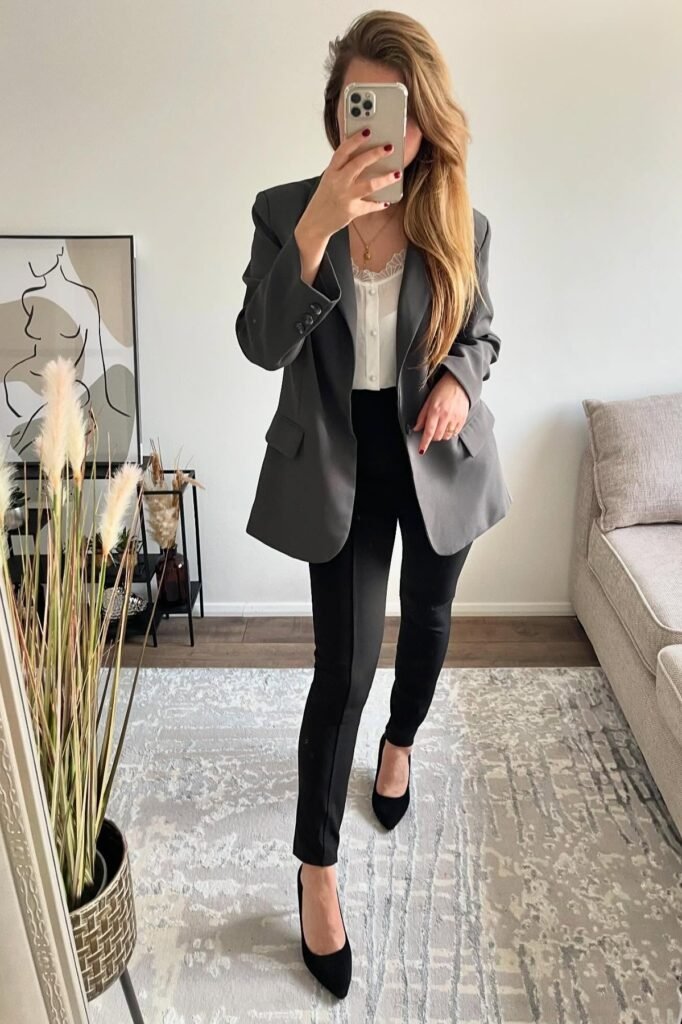Charcoal Grey Oversized Blazer + White Lace-Trim Blouse + Black Tailored Trousers + Black Pointed Toe Pumps