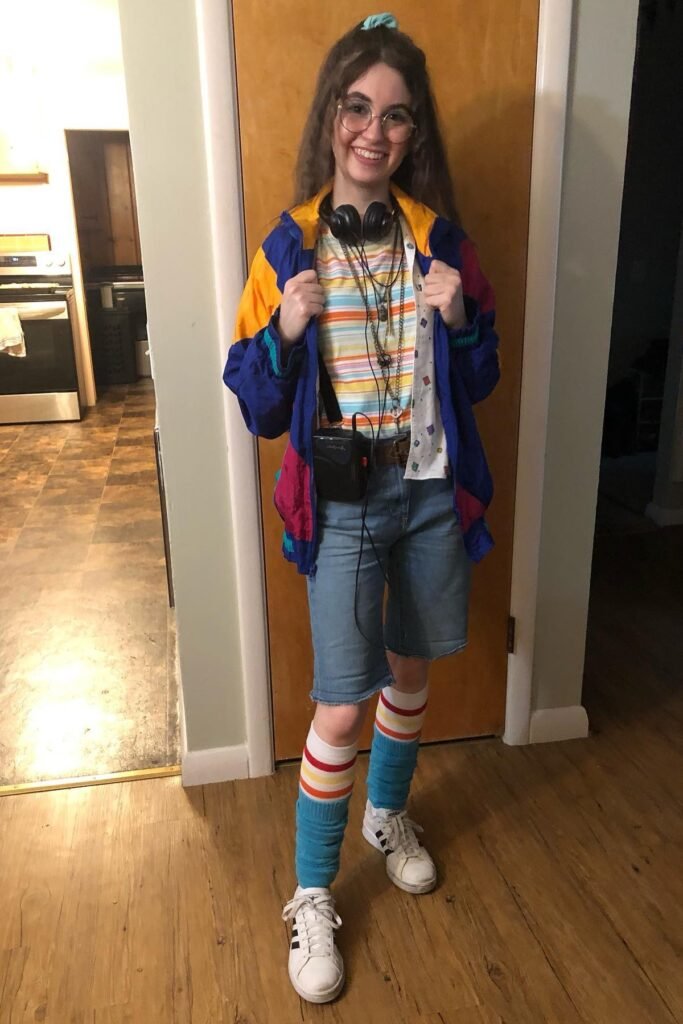 Color-block Windbreaker + Striped T-shirt + Denim Shorts + Leg Warmers + White Sneakers