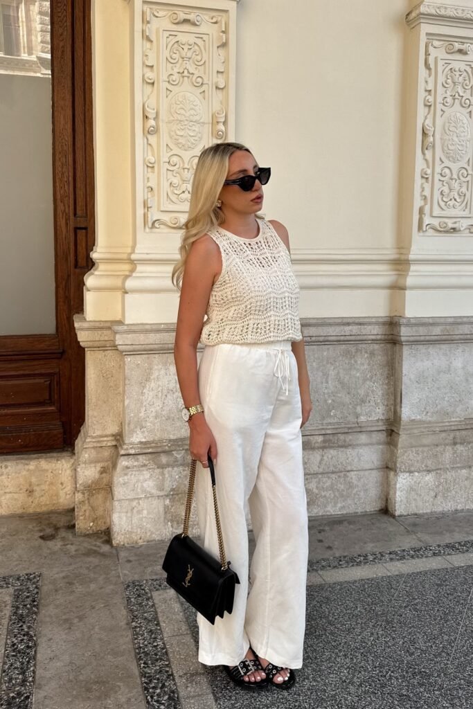 Cream Crochet Sleeveless Top + White Linen Wide-Leg Pants + Black Buckle Sandals