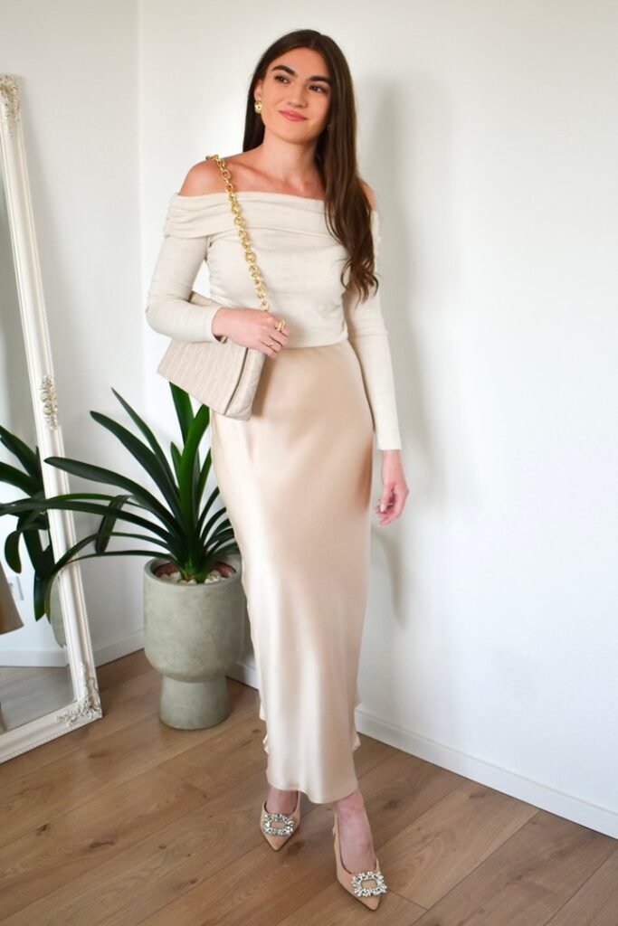 Cream Off-The-Shoulder Long-Sleeve Top + Champagne Satin Midi Skirt + Embellished Nude Flats