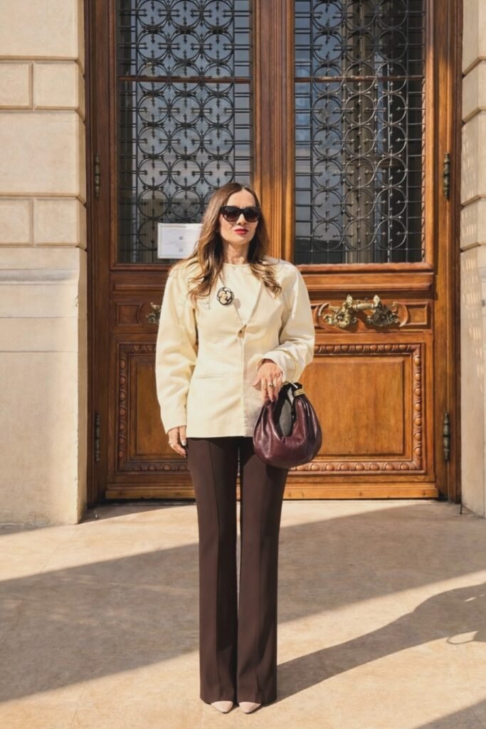 Cream Sculptural Jacket + Dark Brown Flared Trousers + Pointed-Toe Nude Flats