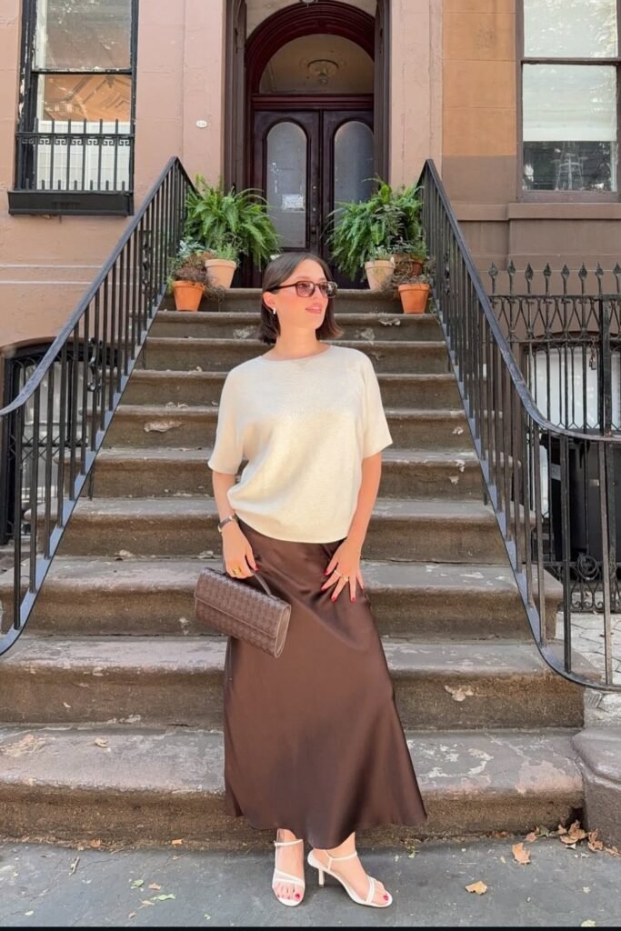 Cream Short-Sleeve Knit Top + Chocolate Brown Satin Midi Skirt + White Strappy Heels