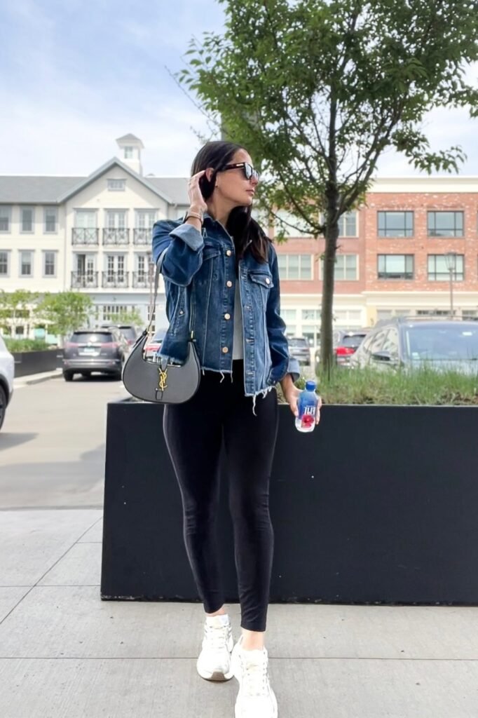 Cropped Raw-Hem Denim Jacket + Black Leggings + White Athletic Sneakers