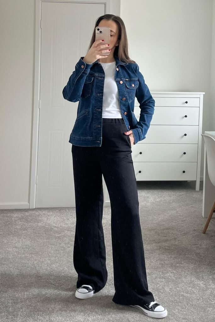 Dark Wash Denim Jacket + White Crop Top + Black Wide-Leg Trousers + Black and White Canvas Sneakers