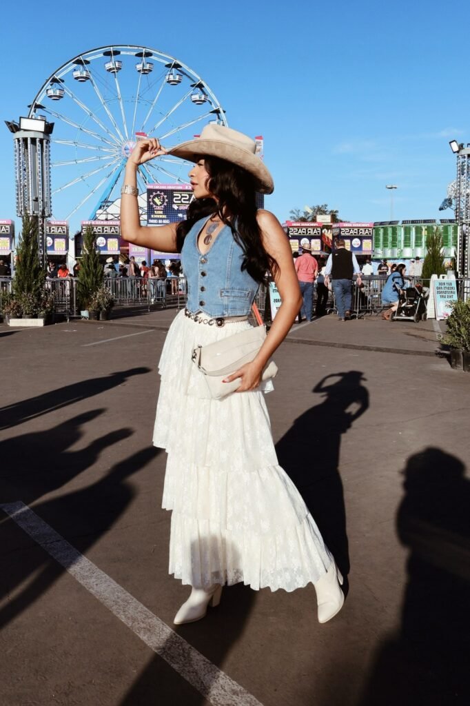 Denim Vest + Tiered White Lace Maxi Skirt + Beige Cowboy Hat + White Pointed-Toe Boots