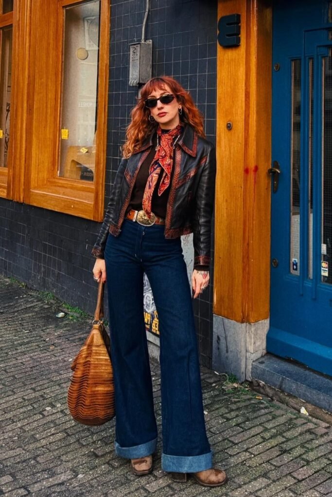 Embroidered Leather Jacket + High-Waisted Flare Jeans + Patterned Scarf