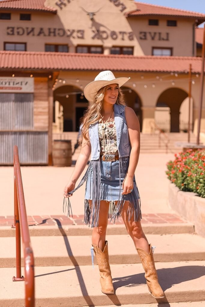 Floral Corset Top + Denim Vest & Fringe Skirt + Tan Cowboy Boots