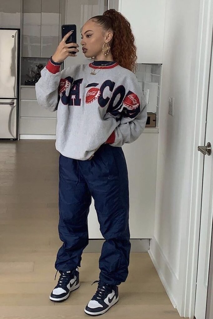 Grey Coca-Cola Sweatshirt + Navy Track Pants + Blue and White High-Top Sneakers