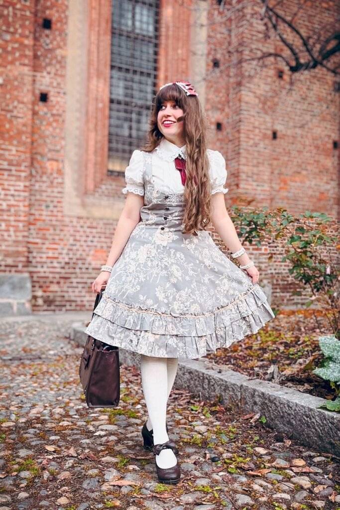 Grey Floral Print Jumper Dress + White Eyelet Blouse + Brown Leather Tote + Brown Bow Heels