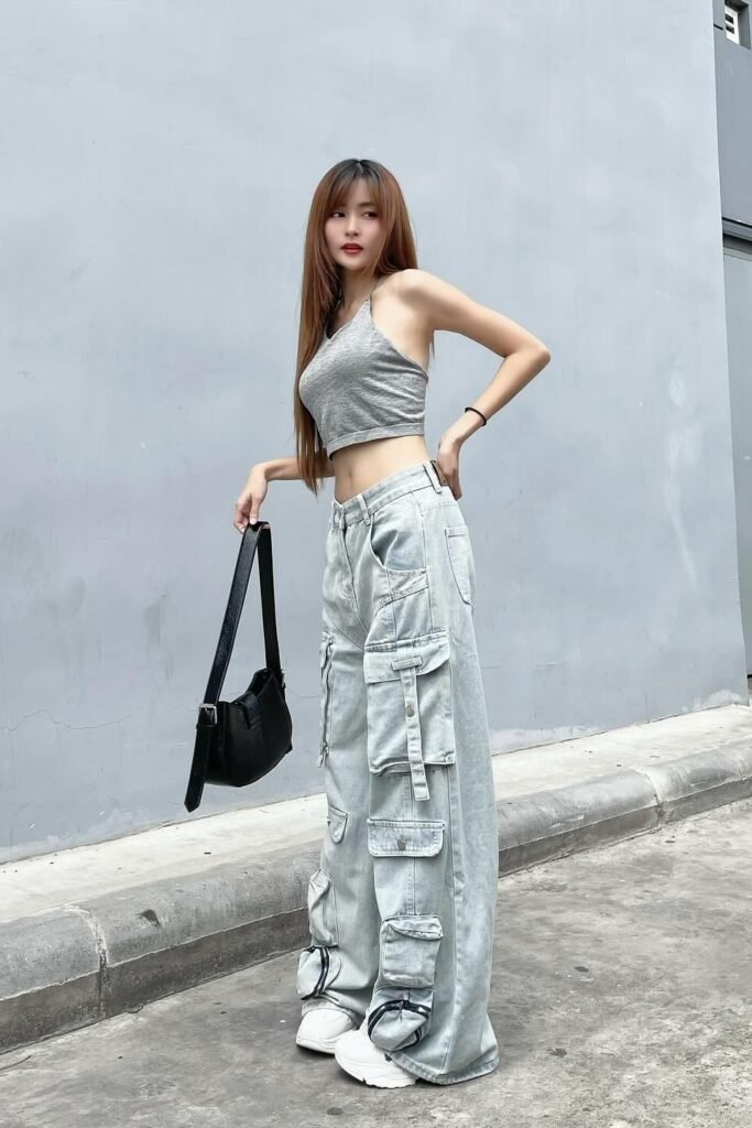 Grey Halter Crop Top + Light Wash Multi-Pocket Cargo Jeans + White Chunky Sneakers