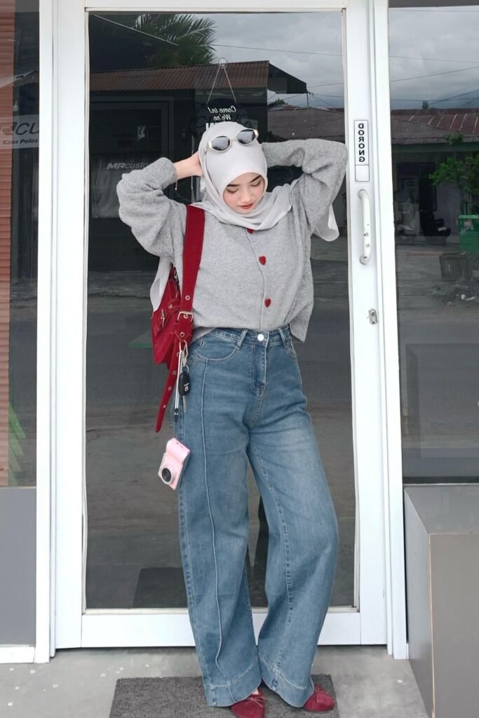 Grey Heart-Button Cardigan + High-Waisted Wide-Leg Jeans + Light Grey Hijab + Red Shoulder Bag
