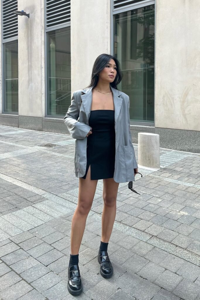Grey Oversized Blazer + Black Mini Dress + Black Socks + Black Prada Loafers