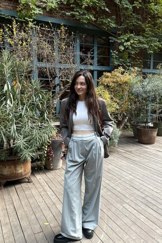 Grey Oversized Blazer + White Crop Top + Pale Blue Wide-Leg Trousers + Black Chunky Boots