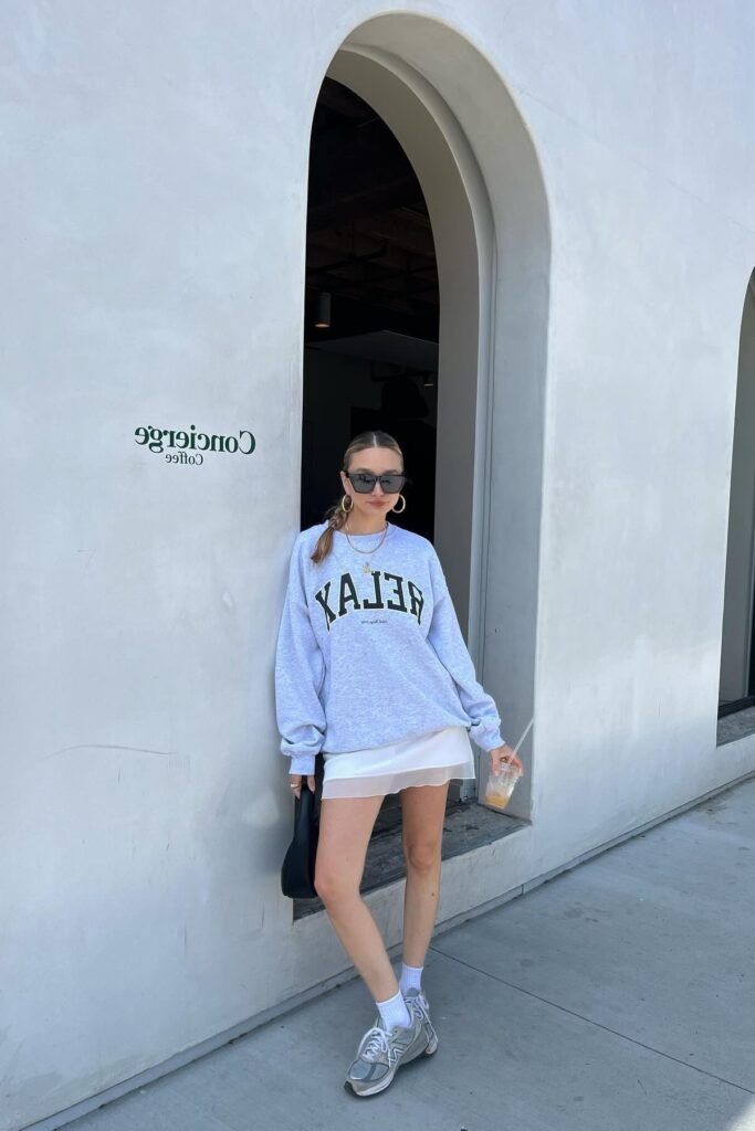 Grey "Relax" Oversized Sweatshirt + White Mini Slip Skirt + Grey New Balance Sneakers