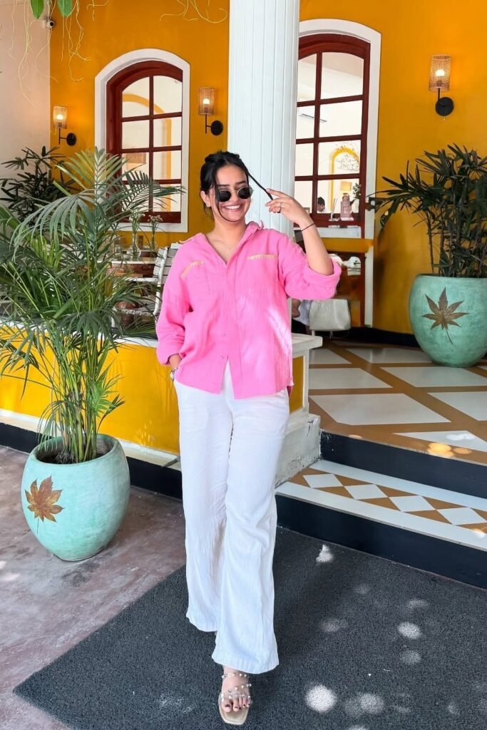 Hot Pink Oversized Button-Up Shirt + White Wide-Leg Trousers + Studded Strappy Sandals