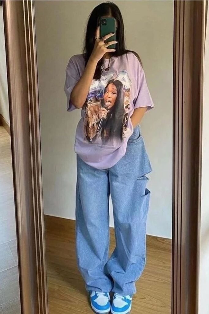  Lavender Graphic Oversized T-Shirt + Light Wash Distressed Wide-Leg Jeans + Blue and White Sneakers