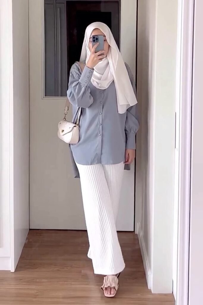 Light Blue Button-Down Shirt + White Pleated Wide-Leg Trousers + Beige Ruffled Sandals