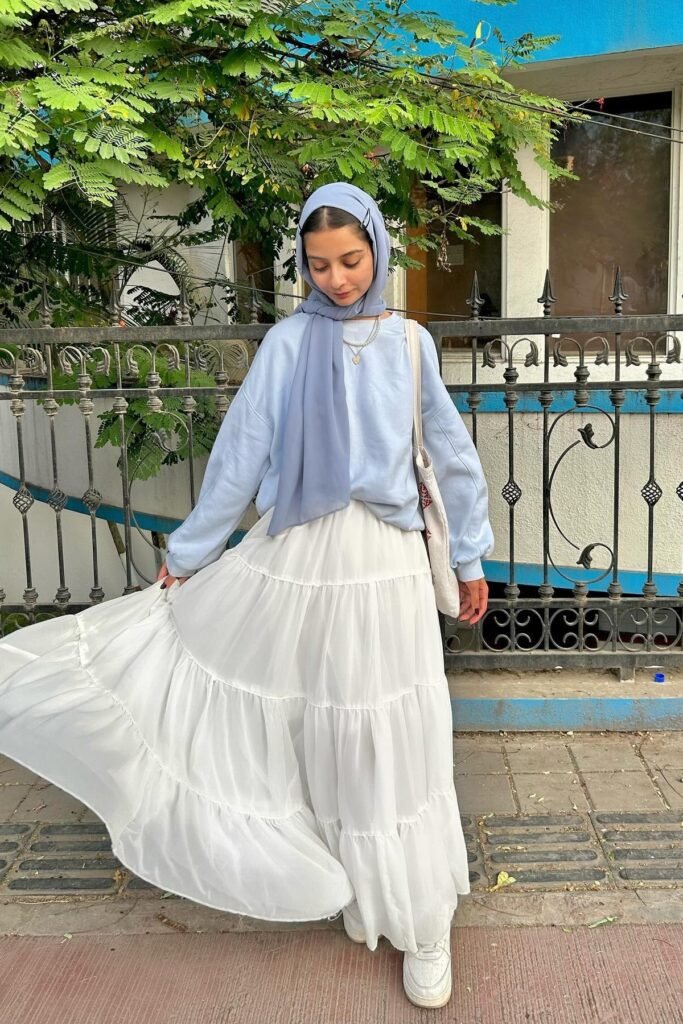 Light Blue Oversized Sweatshirt + White Tiered Maxi Skirt + White Sneakers