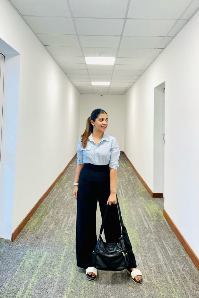 Light Blue Utility Shirt + Black High-Waisted Wide-Leg Trousers + White Braided Sandals