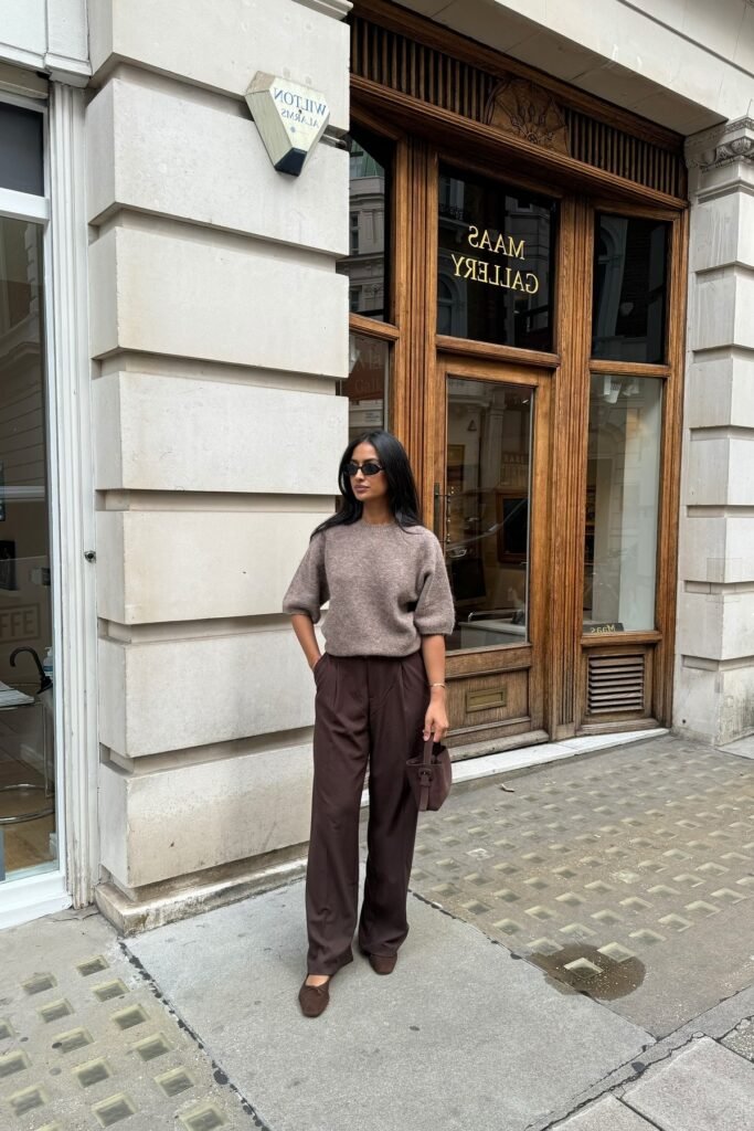 Mocha Short-Sleeve Knit Sweater + Dark Brown Tailored Trousers + Brown Suede Ballet Flats + Dark Brown Mini Handbag
