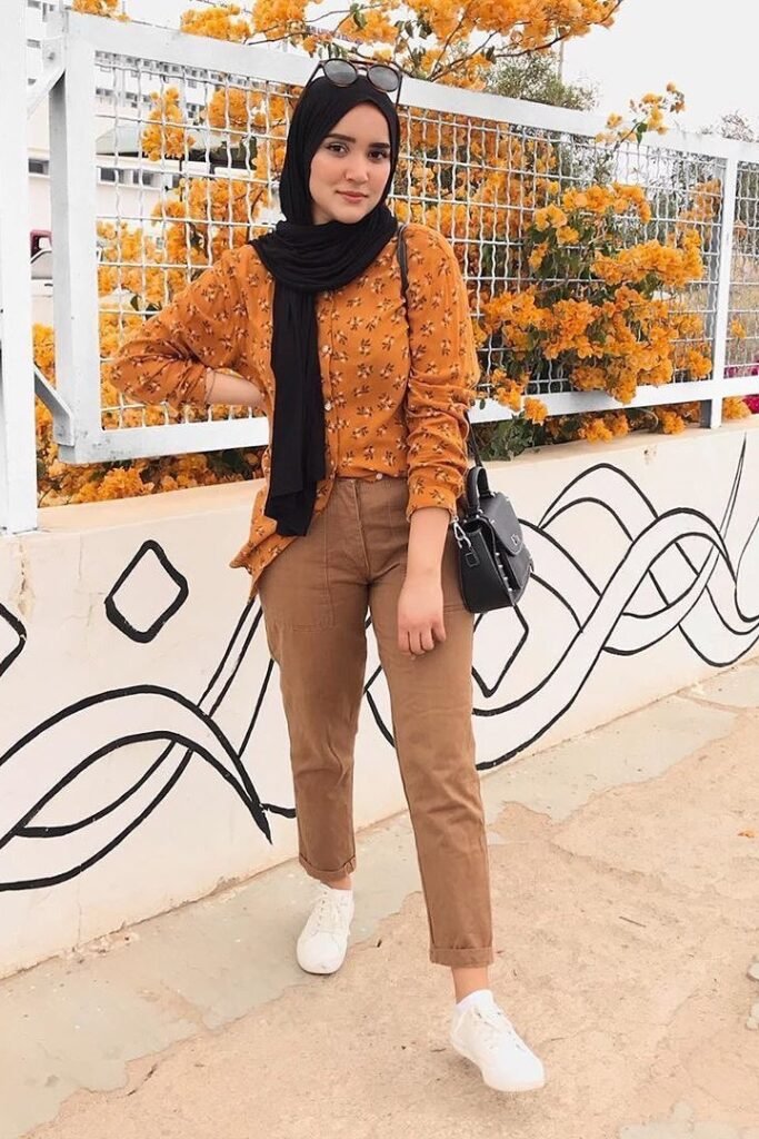Mustard Floral Button-Down + Tan Cropped Chinos + Black Hijab + White Sneakers