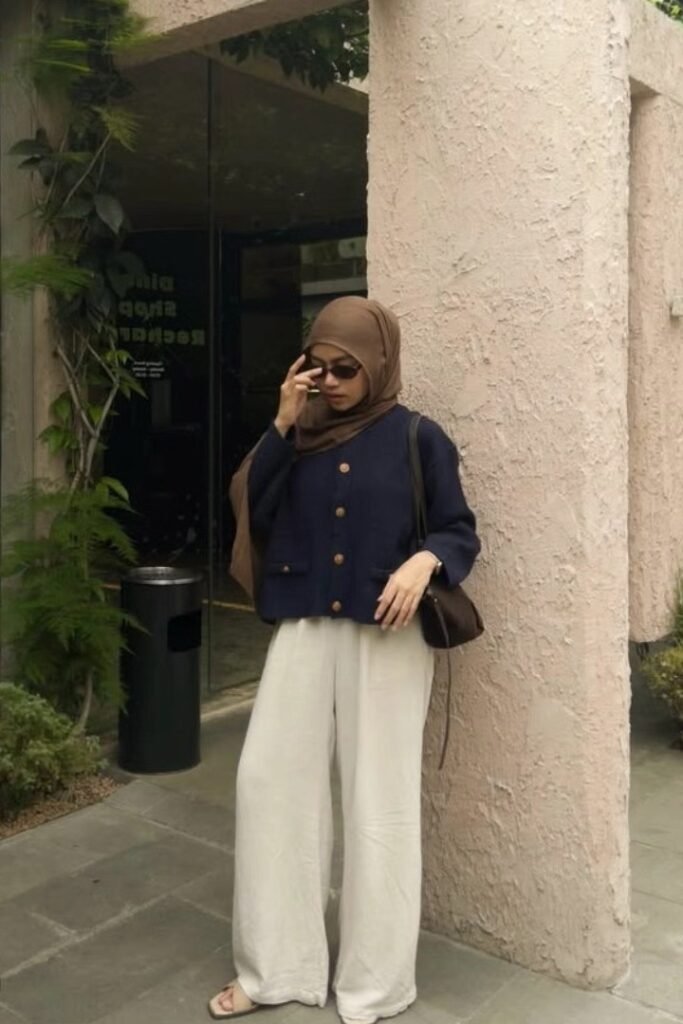 Navy Blue Button-Down Cardigan + Off-White Wide-Leg Trousers + Beige Strappy Sandals