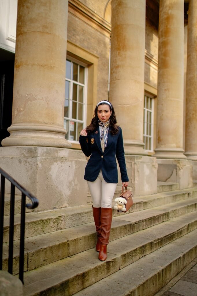 Navy Crested Blazer + Beige Skinny Trousers + Brown Knee-High Boots