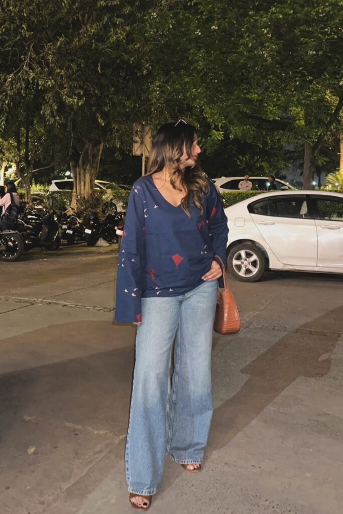 Navy V-Neck Printed Blouse + Light Wash Wide-Leg Jeans + Brown Sandals