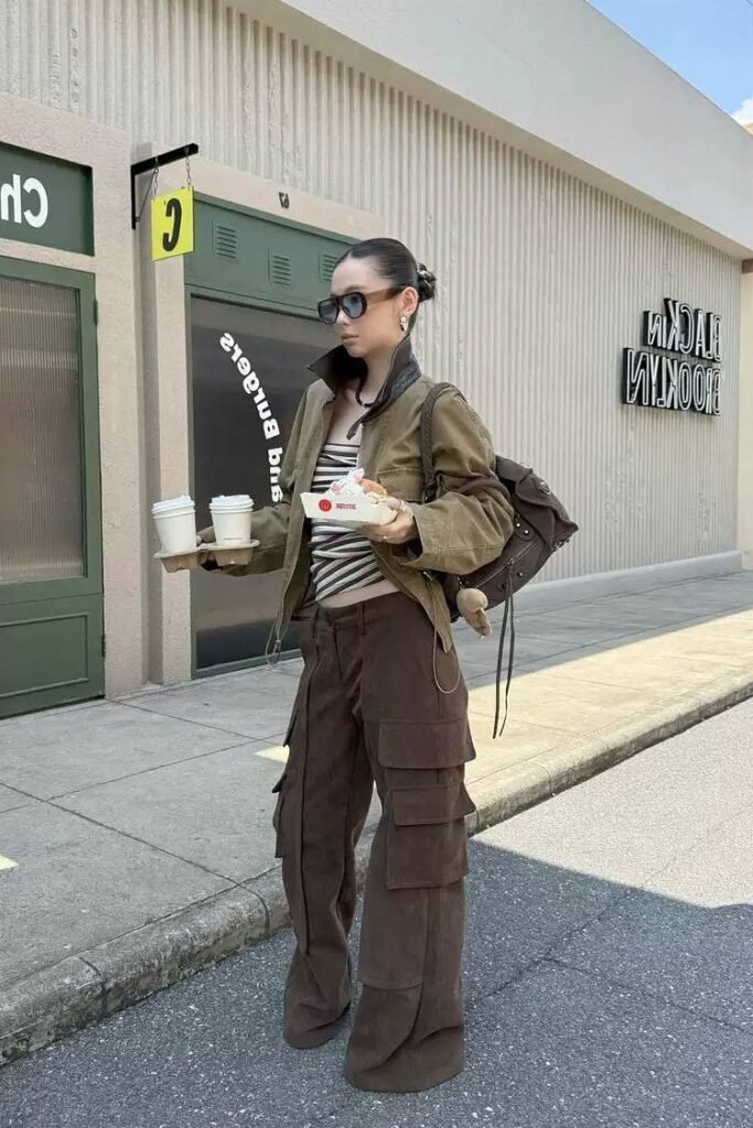 Olive Utility Jacket + Striped Tube Top + Brown Multi-Pocket Cargo Pants + Black Sandals