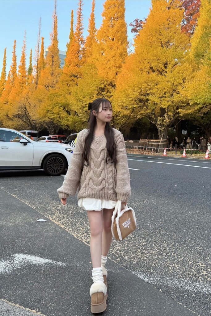 Oversized Beige Cable-Knit Sweater + White Ruffle Skirt + Platform Fur-Lined Mules