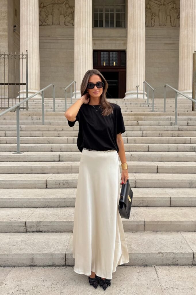 Oversized Black T-Shirt + Cream Satin Maxi Skirt + Black Pointed Toe Flats