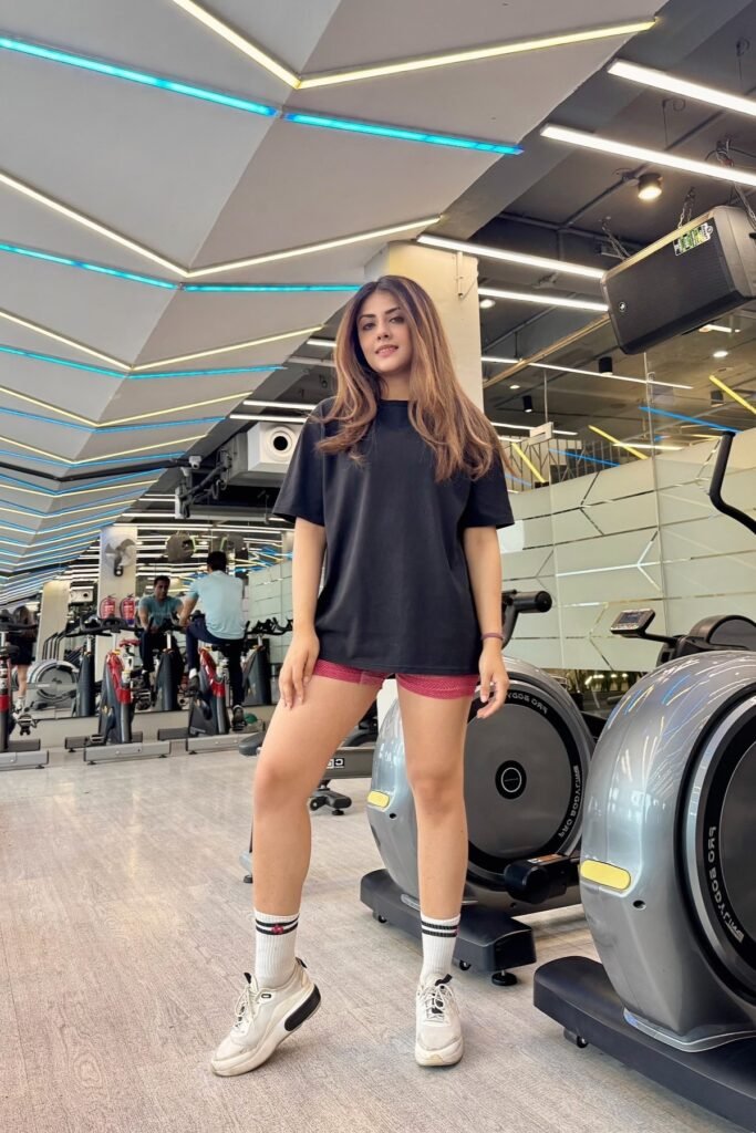 Oversized Black T-Shirt + Pink Spandex Shorts + White High-Top Socks + White Chunky Sneakers