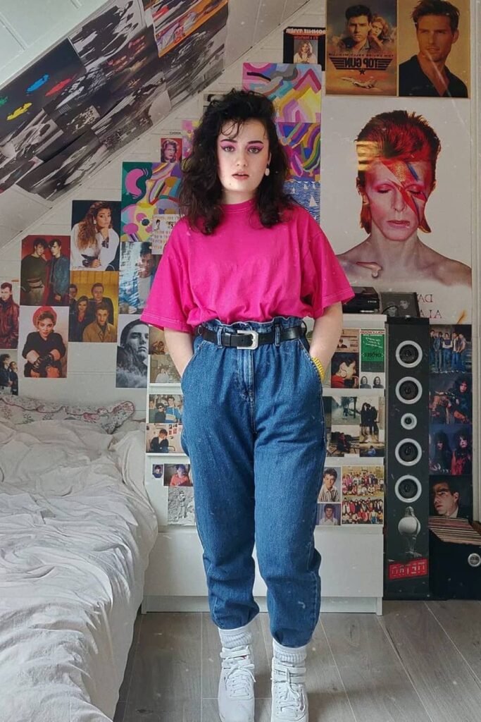 Oversized Bright Pink T-Shirt + High-Waisted Tapered Blue Jeans + White High-Top Sneakers