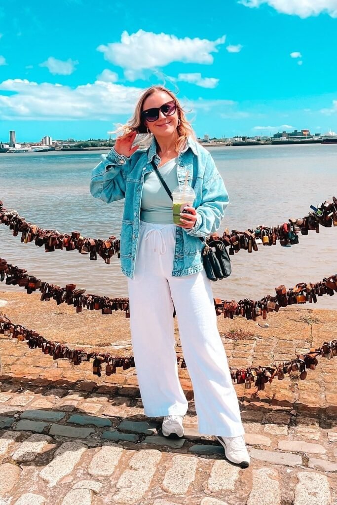Oversized Denim Jacket + Sage Green Bodysuit + White Drawstring Wide-Leg Pants + White Sneakers