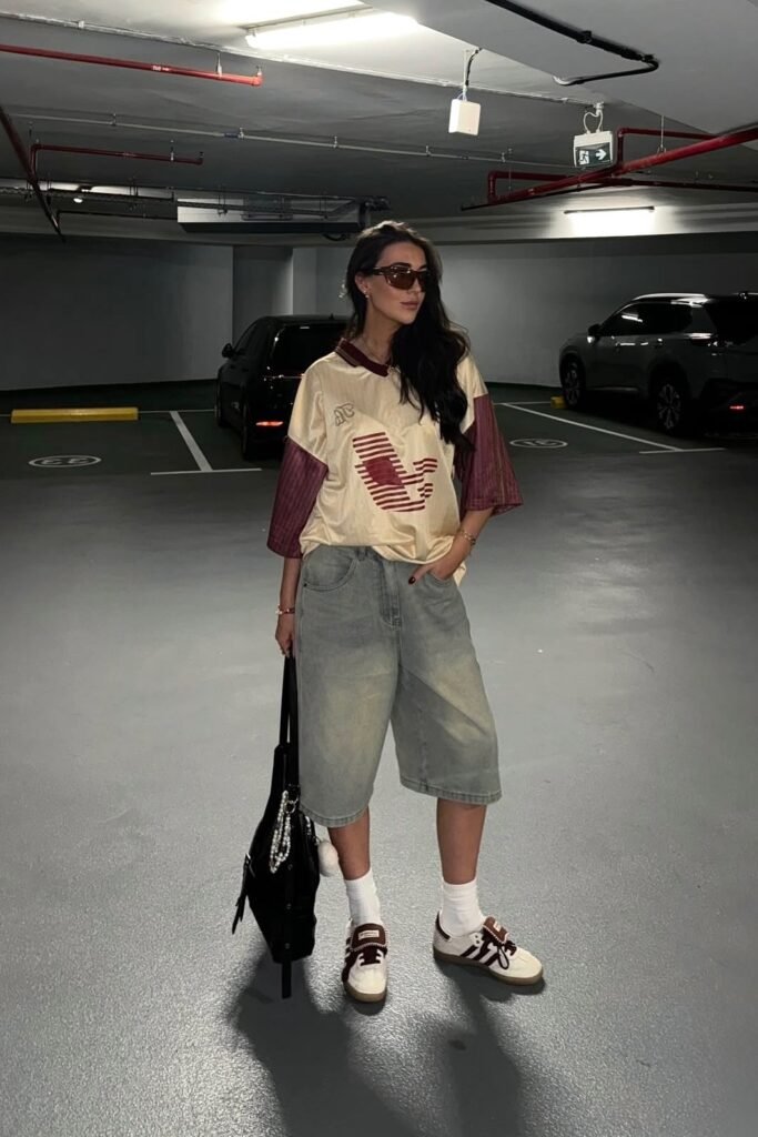 Oversized Vintage Jersey + Wide-Leg Light Blue Denim Shorts + Brown and White Sneakers with White Socks