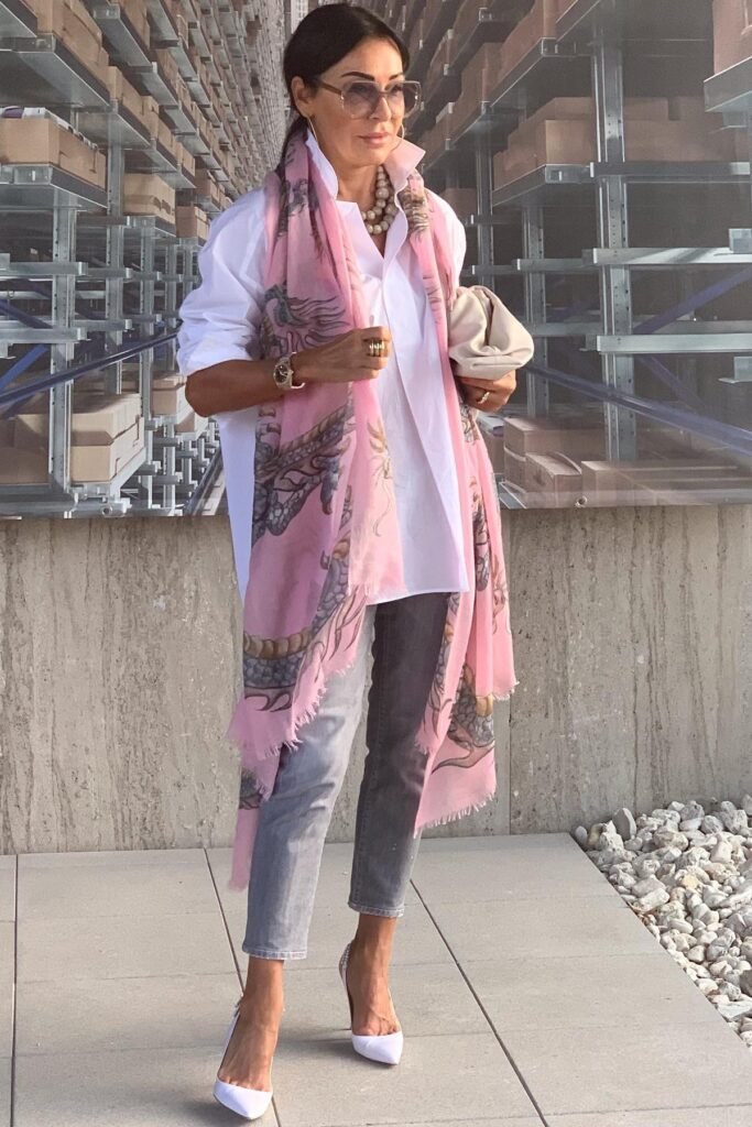 Oversized White Button-Down + Pink Printed Silk Scarf + Grey Faded Slim-Fit Jeans + White Pointed-Toe Heels