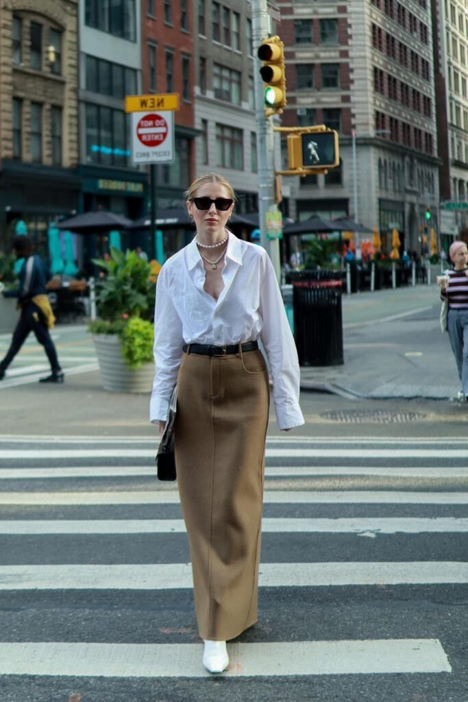 Oversized White Button-Down Shirt + Brown Maxi Column Skirt + White Pointed-Toe Boots