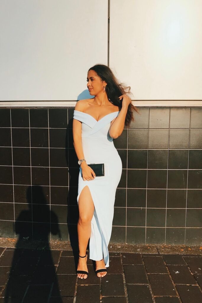 Pale Blue Off-the-Shoulder Maxi Dress + Black Clutch + Black Stiletto Sandals