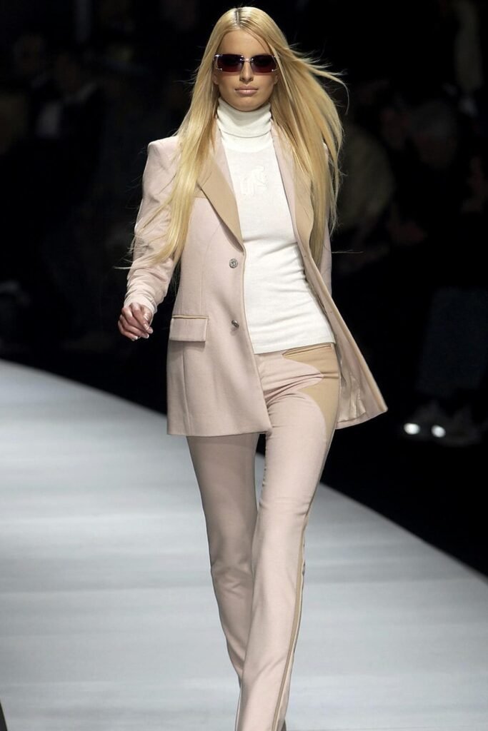 Pale Pink Blazer + White Turtleneck + Matching Pink Trousers with Tan Accents