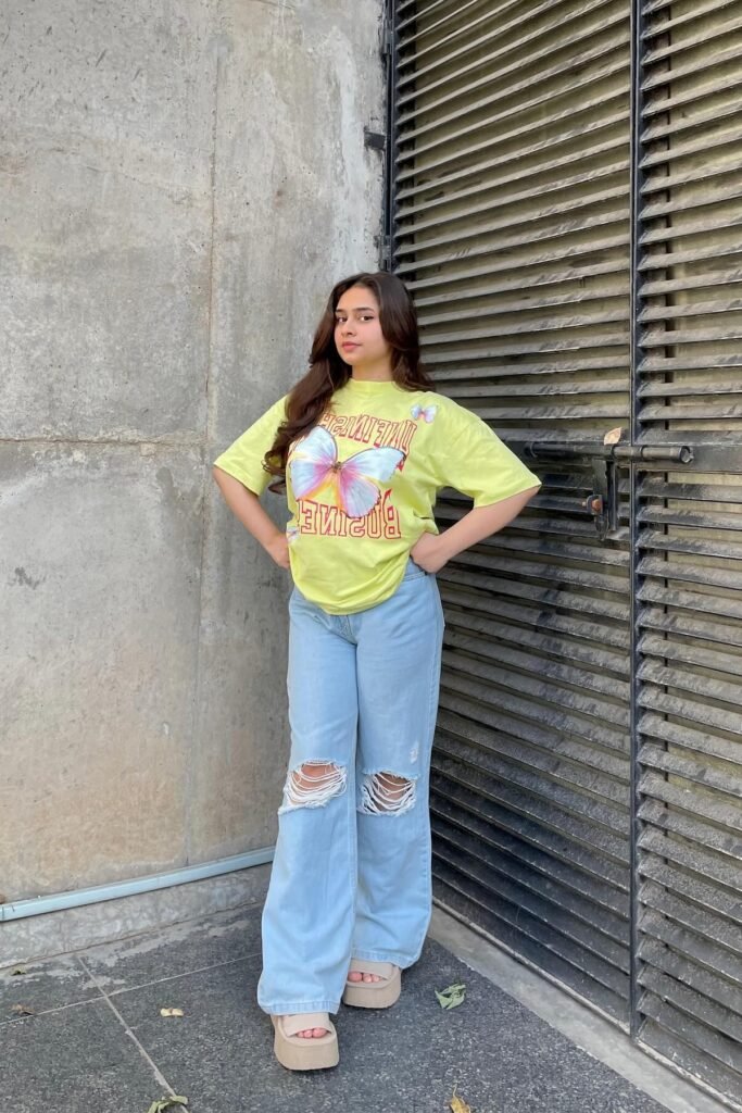 Pale Yellow Butterfly Graphic T-shirt + Light Wash Ripped Wide-Leg Jeans + Beige Platform Sandals