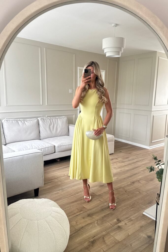 Pale Yellow Sleeveless Midi Dress + Gold Strappy Heels + White Shell Clutch
