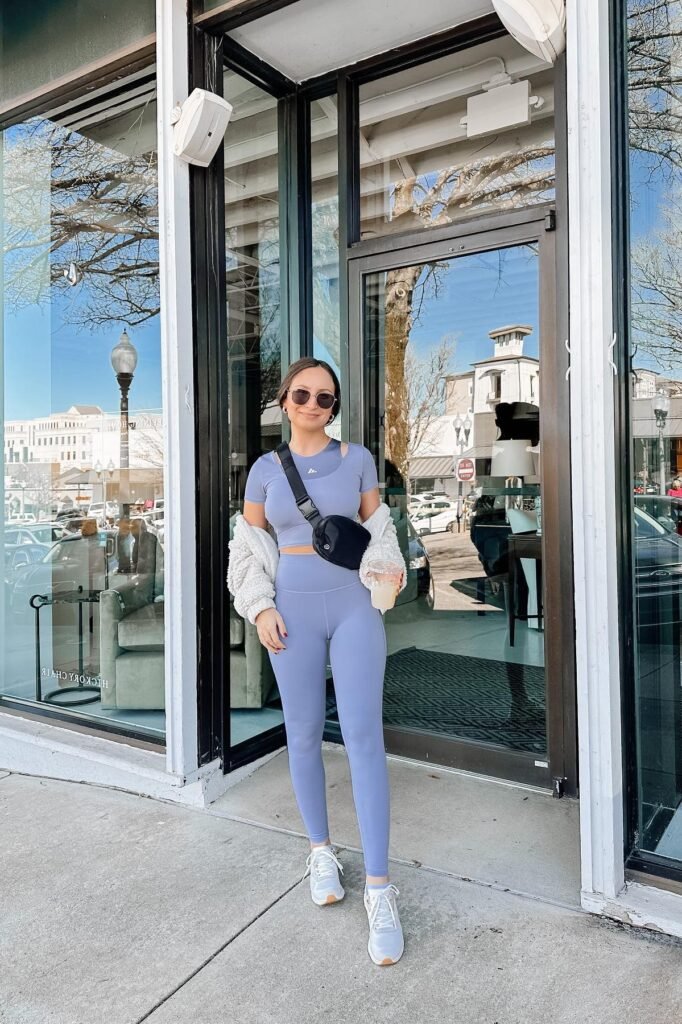 Periwinkle Blue Athletic Set + White Sherpa Jacket + White Sneakers + Black Crossbody Bag