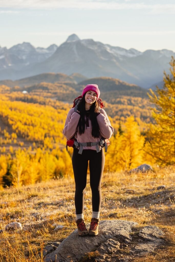 Pink Beanie + Mauve Fleece Pullover + Black Leggings + Brown Hiking Boots