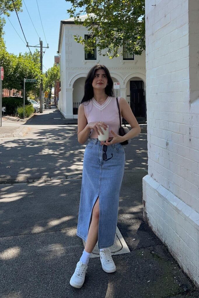 Pink Knit Vest + Denim Maxi Skirt + White Sneakers
