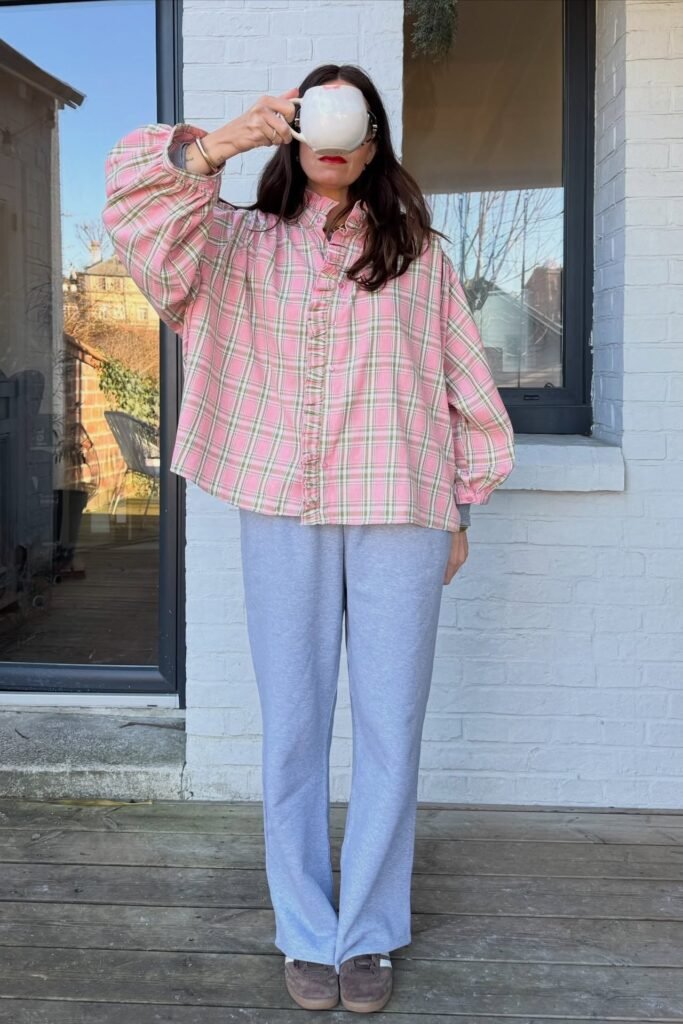 Pink Plaid Ruffled Blouse + Grey Straight-Leg Sweatpants + Brown Suede Sneakers