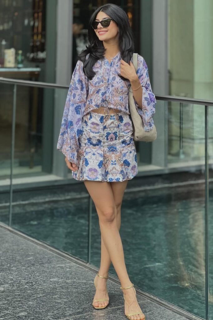 Purple Floral Bell-Sleeve Crop Top + Matching Floral Mini Skirt + Gold Strappy Heels