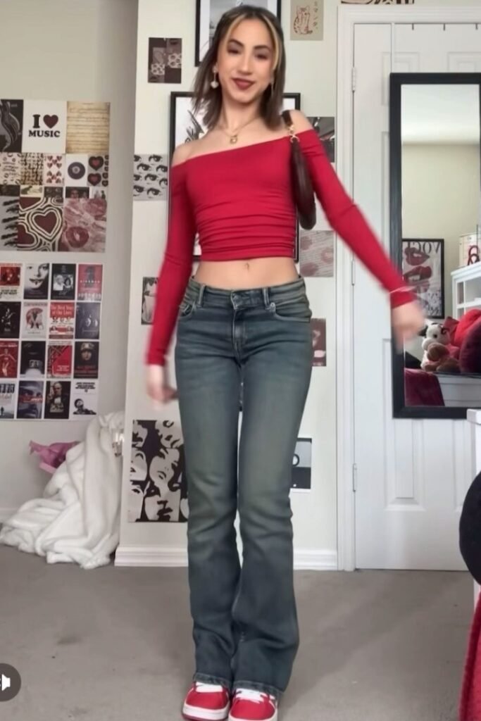 Red Off-the-Shoulder Long Sleeve Top + Medium Wash Bootcut Jeans + Red and White Sneakers