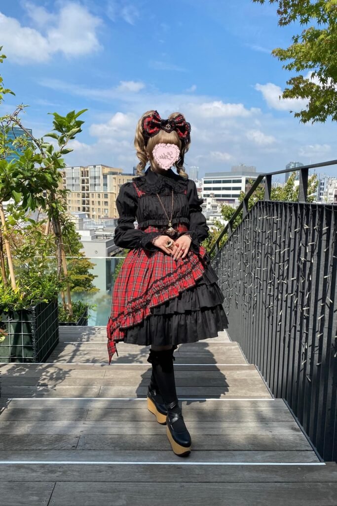Red Tartan Plaid Asymmetrical Skirt + Black Ruffled Blouse + Black Bow Headband + Black Platform Shoes